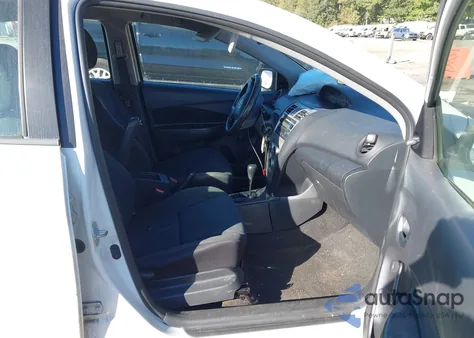 2009 Toyota Yaris from USA, damaged, VIN JTDBT903X94054376